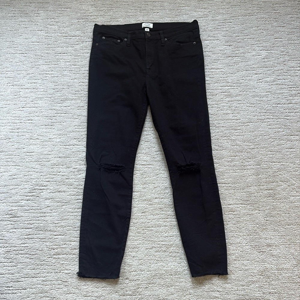 Jcrew black skinny jean with adorable fray detail.